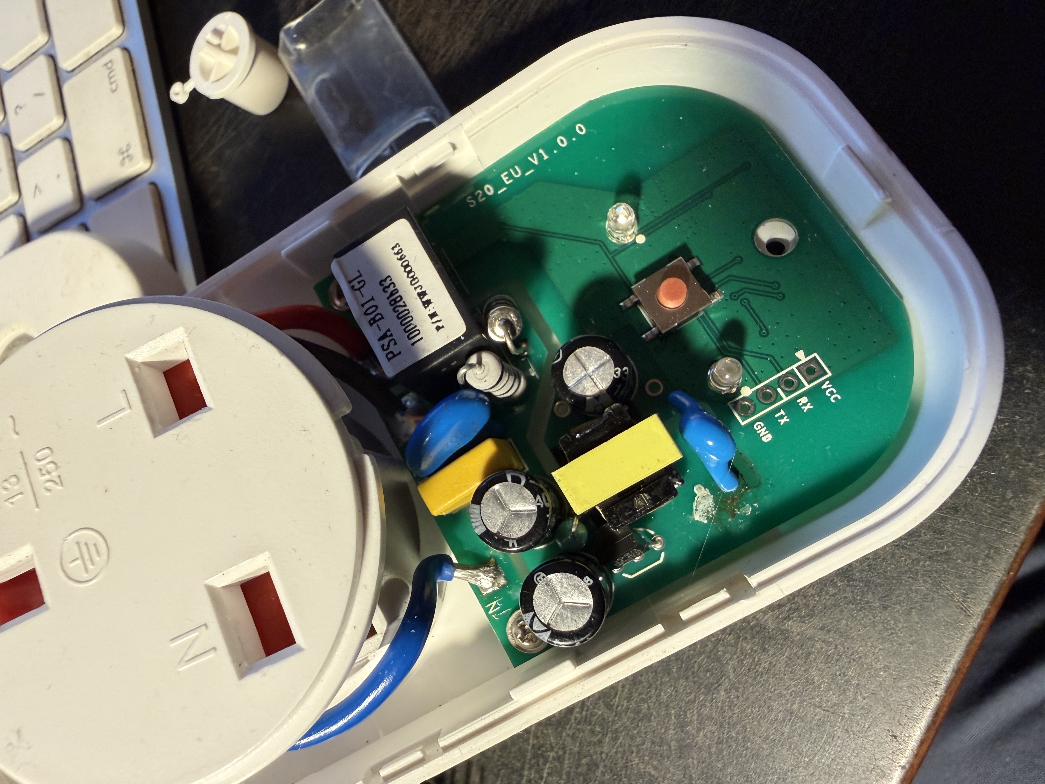 S20 opened showing PCB and programming pads